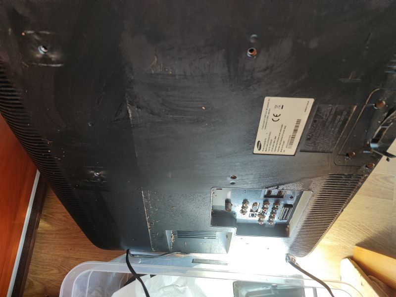 Flooded Samsung TV - Back Panel Back of Samsung LE32A330J1N TV with visible dirt from flooding.