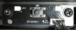 Płytka elektroniczna z wyłącznikiem monostabilnym marki nieznanej, z oznaczeniem SW1.