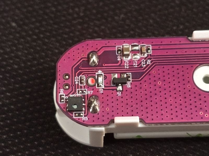 Close-up of Zigbee sensor PCB with visible SMD components