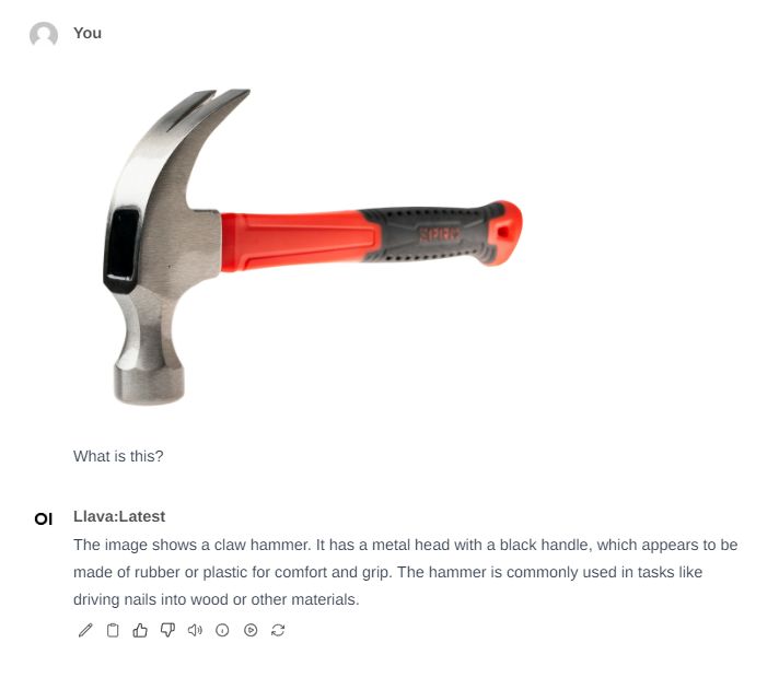 Claw Hammer with Black and Red Handle The image shows a claw hammer with a metal head and a black and red handle.