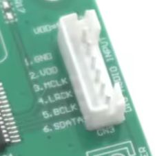 Pin connector on a green printed circuit board with labeled pins.