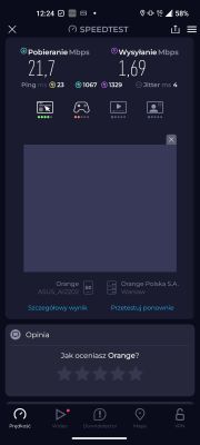 Ekran testu prędkości internetu mobilnego Orange na telefonie Asus Zenfone 9. Wynik: pobieranie 21,7 Mbps, wysyłanie 1,69 Mbps.