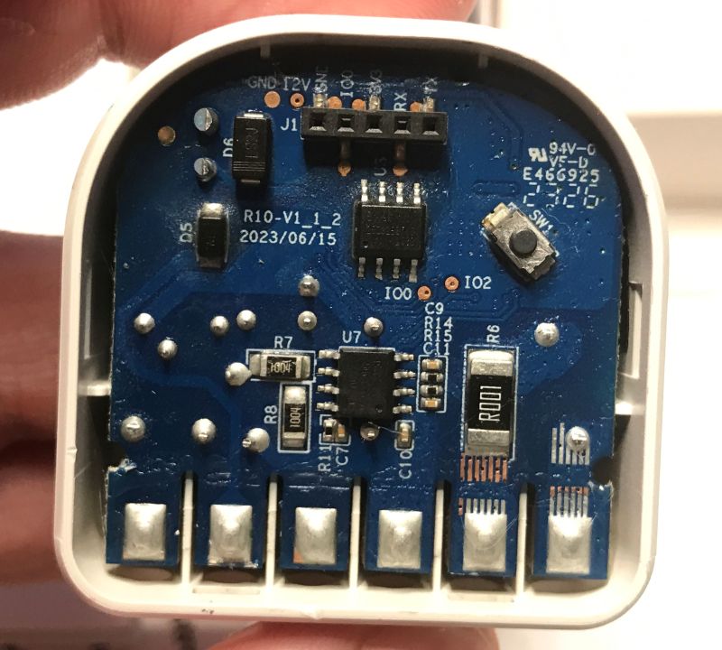 Close-up of Refoss R10 PCB with visible components and programming header J1