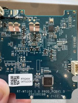 Motherboard with various electronic components, including an Allwinner XR806 SoC chip.