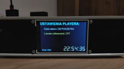 Settings menu of an audio player showing playback time and shuffle mode options
