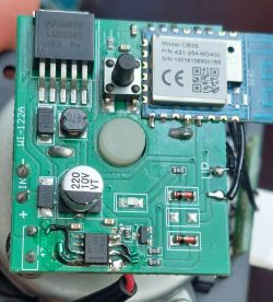 Inside view of the ATLO-V1-TUYA actuator with the top cover removed, showing the main electronics board with TUYA CB3S module and BDR6122T chip, plus a smaller board with two limit switches.