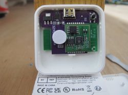 Interior of an electronic device showing PCBs and a USB port.
