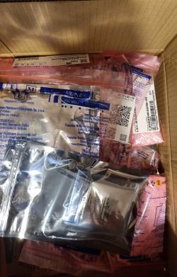 TME electronic components packed in antistatic bags Box of TME electronic components in antistatic bags, ready for PCB assembly.