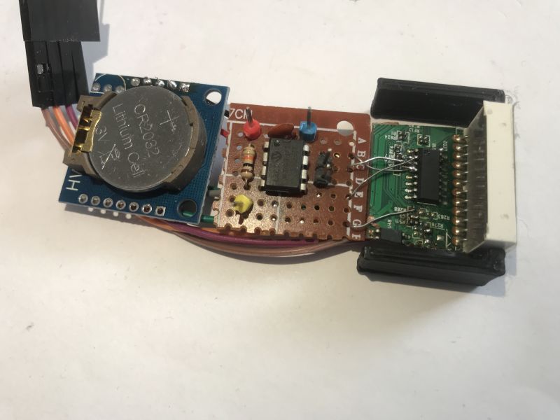 Simple clock on PIC12F683 - three pins, two I2C buses - DS1307 + FD650
