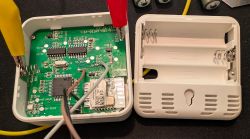 Interior of a Tuya Wi-Fi Smart Thermometer Interior of a disassembled Tuya Wi-Fi smart thermometer showing the PCB with a CBU (BK7231N) module and battery connectors.