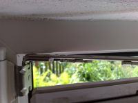 Plastic Double-Leaf Window (Movable Mullion): Wind Whistling & Blowing at Hinge, Upper Left Corner Plastic Double-Leaf Window (Movable Mullion): Wind Whistling & Blowing at Hinge, Upper Left Corner