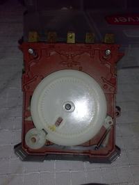 Zmywarka Haier DW9-AFM - Jak złożyć programator po czyszczeniu styków?