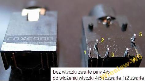 A broken mini jack plug is stuck in the audio input on the laptop.