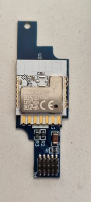 WiFi Module BK7231N on PCB WiFi module BK7231N on a blue PCB with several components.
