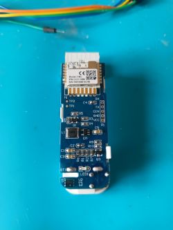 Electronic module with components and connector