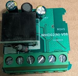 PCB labeled WHD02(N) V08 with components including transformer, capacitors, and terminal block