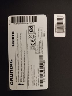 Information sticker on a Grundig TV.