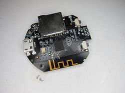 Round PCB with microSD and USB connectors Round printed circuit board with micro USB port, microSD slot, and built-in antenna.
