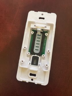 Device panel with internal circuit board.