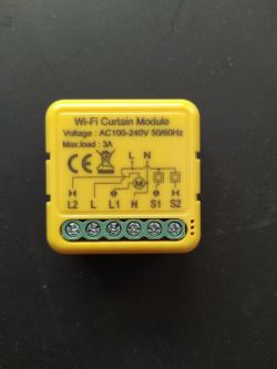 Yellow Wi-Fi Curtain Module Yellow Wi-Fi curtain module with voltage and max load markings.