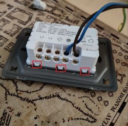 Milfra TB-23 Wall Socket Teardown Milfra TB-23 wall socket with visible wires and clips.