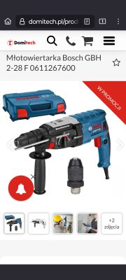 Młotowiertarka Bosch GBH 2-28 F 0611267600 wraz z walizką transportową i dodatkowym uchwytem.