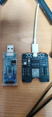 Two USB Programmers Two electronic programmers, FT232R USB on the left, and a board with a PROG button and micro USB port on the right.