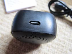 Micro USB Port on Electronic Device Micro USB port on a black plastic electronic device.