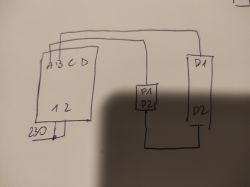Schemat elektryczny z oznaczeniami A, B, C, D, P1, P2, D1, D2 oraz napięcie 230V.