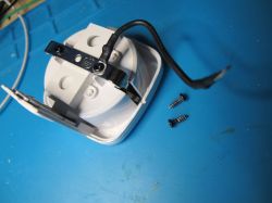 Interior of LSPA9 Smart Plug View of the interior of the LSPA9 smart plug with visible screws and wires.