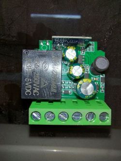 Tuya Mini Smart Switch Circuit Board Top view of a circuit board with electronic components in a Tuya Mini Smart Switch device.