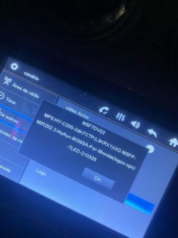 Photo of a car multimedia system screen showing an error message related to an MP5 card.