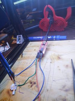 Microcontroller flashing setup with short wires.