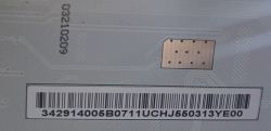 Circuit board with serial number and barcode Close-up of a circuit board with barcode and printed serial number