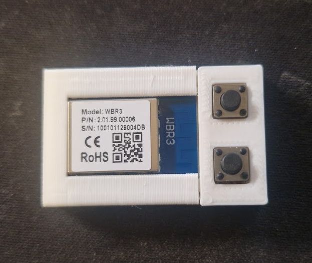 WBR3 Wi-Fi module in a white adapter with BOOT and RESET buttons