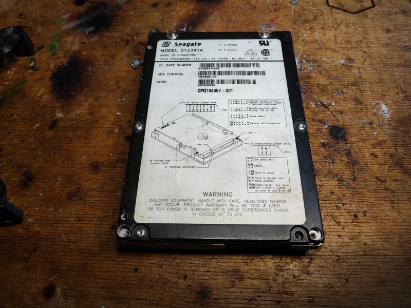 Seagate ST3390A Drive from 1994 Front of Seagate ST3390A drive with label on a wooden table