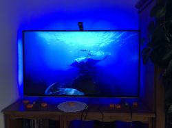 TV with blue LED backlight and a calibration camera mounted on top