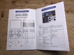 R36S handheld manual showing button diagrams and technical specification table