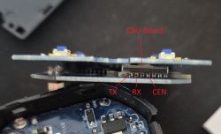Pin Connections on the CBU Board Close-up of two connected circuit boards with TX, RX and CEN pin labels on the CBU board.