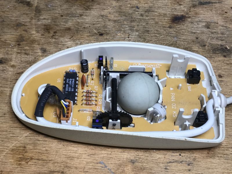 Interior of an Old Ball Mouse Interior of an old ball mouse without a scroll wheel.