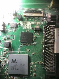Close-up of Thomson TV mainboard with RTD2841SAA and SK Hynix e-NAND chips