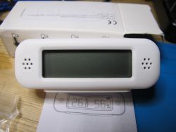 Temperature and Humidity Sensor Display ZY-TH02Pro Digital display of temperature and humidity sensor in a white casing.