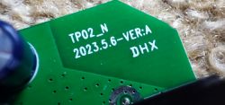 Close-up of TP02_N Circuit Board Close-up of a green circuit board labeled TP02_N 2023.5.6-VER:A DHX.
