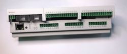 PLC controller with multiple connectors and ports, top view.