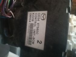 Wymiana modułu centralnego zamka w Mazda 5 2006r - Mitsubishi na Visteon