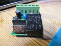 ESPC2-02 module on a PCB with a relay.