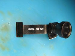 Camera module with LT1868-T04 V1.0 cable on blue background