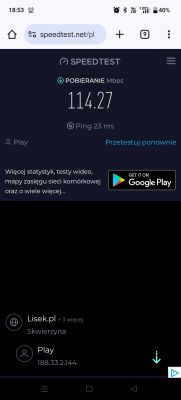 Ekran testu prędkości internetu z wynikiem 114,27 Mbps.