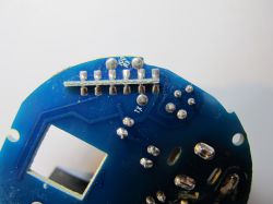 Close-up photo of a Teckin SP23 PCB with soldered connectors.