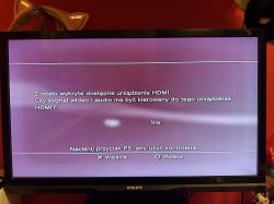 Obraz ekranu telewizora z komunikatem o wykryciu urządzenia HDMI.